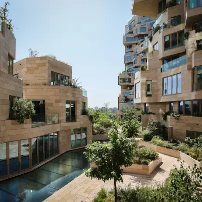 Exterior view of the office building at Beethovenstraat 503, Amsterdam Zuidas, featuring modern architecture and garden areas, ideal for those seeking office space rental.