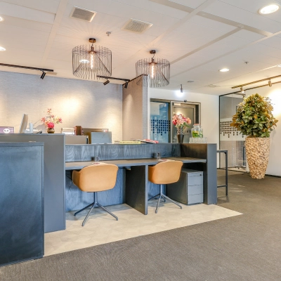 Modern furnished office space at Gustav Mahlerplein, featuring sleek desks and comfortable chairs, perfect for office space rental in Amsterdam Zuidas.