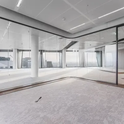 Spacious unfurnished office space with glass walls, ideal for office space rental in Amsterdam Zuidas at Hildegard Von Bingenstraat 44.