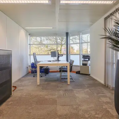 Bright office space for rent at Prins Willem-Alexanderlaan 301, Apeldoorn, featuring modern furnishings and ample natural light.