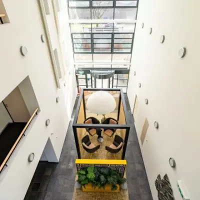 Interior of Schumanpark 9 in Apeldoorn, showcasing a bright, open workspace suitable for office space rental.