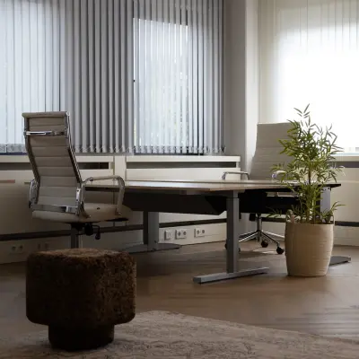 Furnished office space at Schumanpark 9, Apeldoorn, featuring modern chairs and a desk, ideal for office space rental.