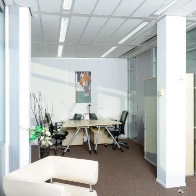 Bright office space at Carrer de la Marina 16-18, Barcelona Sant Martí, featuring modern furnishings and natural light. Perfect for rent office space seekers.