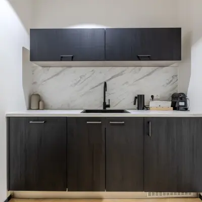 A compact, stylish pantry area in an office at Rijtuigweg 10, Bergen op Zoom, available for office space rental.