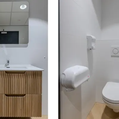 Modern restroom available in office space rental at Rijtuigweg 10, Bergen op Zoom, featuring sleek fixtures and minimalist decor.