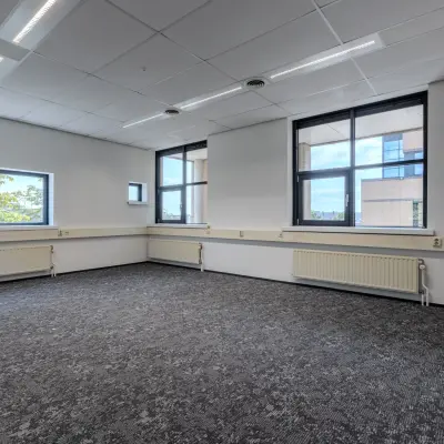 Bright office space at Rijtuigweg 10, Bergen op Zoom, perfect for office space rental with large windows letting in natural light.