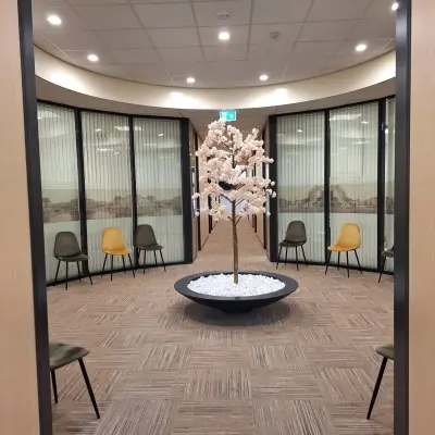 Office to rent at Zuidzijde Haven 39a, Bergen op Zoom featuring a stylish interior with modern seating around a decorative centerpiece.
