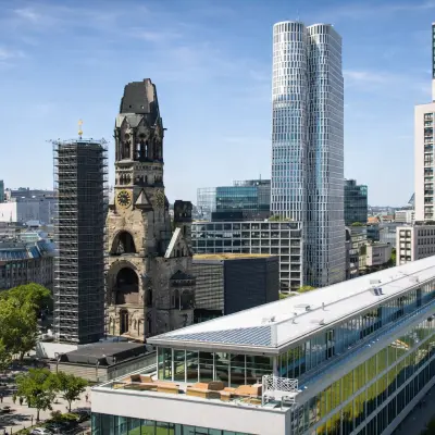View from Kurfürstendamm 11 in Berlin Charlottenburg showing the surrounding cityscape and prominent buildings.