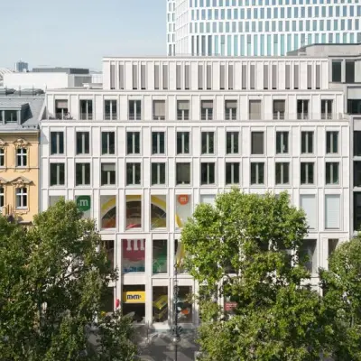 Exterior view of an office building at Kurfürstendamm 14, Berlin Charlottenburg, showcasing potential office space rental opportunities in the area.