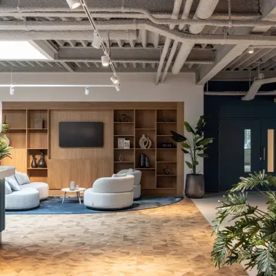 Modern furnished office space rental at Essebaan 63, Capelle aan den IJssel, featuring a stylish lounge area with contemporary seating and decorative elements.