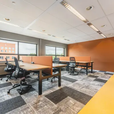 Bright office at Rijnzathe 12, De Meern, with a modern open floor plan featuring desks and chairs available for office space rental.