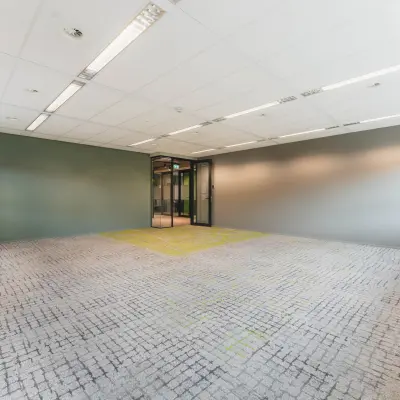 Spacious office at Rijnzathe 12, De Meern, available for rent, featuring large windows and ample lighting, perfect for businesses seeking bright office space rental.