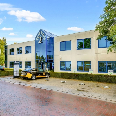 Exterior view of an office building located at Europalaan 2, Den Bosch, ideal for rent office space opportunities.