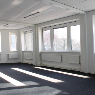 Bright office space rental with large windows at Keulenstraat 12, Deventer, offering a spacious layout for your next office to rent.