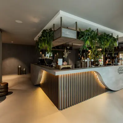 Modern, furnished reception area at Diemerhof 42, Diemen, ideal for office space rental with a welcoming atmosphere.