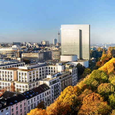 Panoramic view of Dreischeibenhaus 1 amidst Düsseldorf Old Town, surrounded by cityscape and lush trees, ideal for office space rental.