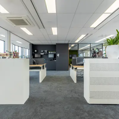 Bright office space with modern furnishings and ample natural light at Meerenakkerplein 1-10, Eindhoven De Hurk. Ideal for office space rental.