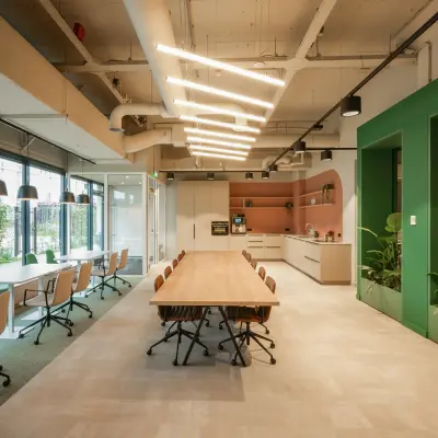 Modern office space at Frederiklaan 10E, Eindhoven Strijp-S with a long conference table, chairs, and well-lit interior for office space rental.