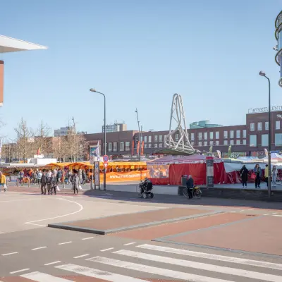 Exterior view at Kuipersdijk 2-4 in Enschede, showcasing a vibrant market next to the office to rent, ideal for those seeking dynamic surroundings for office space rental.