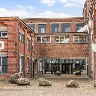 Exterior view of an office building at Rigtersbleek-Zandvoort 10, Enschede, ideal for office space rental.