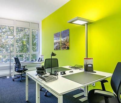 Bright office interior with modern furniture at Mergenthaler Allee 15-21, Eschborn, perfect for office space rental.