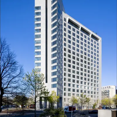 Tall modern office building at Solmsstrasse 83, Frankfurt Bockenheim, ideal for office space rental.