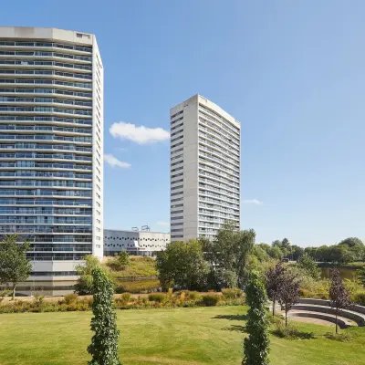 Exterior view of office buildings at Helperpark 270-298 in Groningen, ideal for office space rental with surrounding greenery.