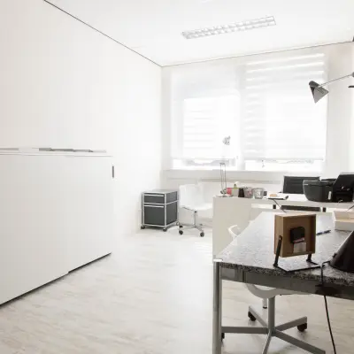 Bright office space at Waarderweg 19 in Haarlem Waarderpolder, with modern furnishings including a desk, chair, lamp, and cabinet, available for office space rental.