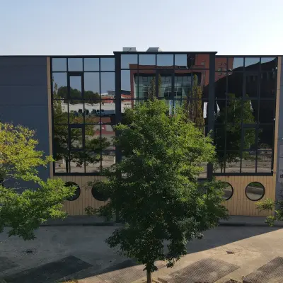Exterior view of an office building at Catharina van Renneslaan 8-10 in Hilversum, ideal for office space rental.