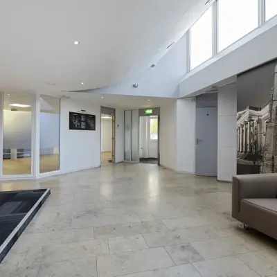 Spacious and modern office interior at Ouddeelstraat 7a in Leeuwarden, featuring sleek design with ample natural light, ideal for those seeking office space rental.