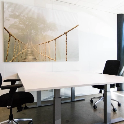 Office to rent at Brieltjenspolder 28, Made, featuring a furnished workspace with two chairs around a white table, suitable for business activities.