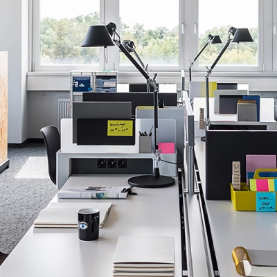 Modern office space at Rosenheimer Straße 143C, München Werksviertel, featuring sleek workstations, ample natural light, and practical furnishings, ideal for office space rental.