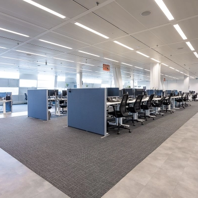 Spacious office space with rows of desks and chairs at Jonkerbosplein 52, ideal for those looking to rent office space in Nijmegen.