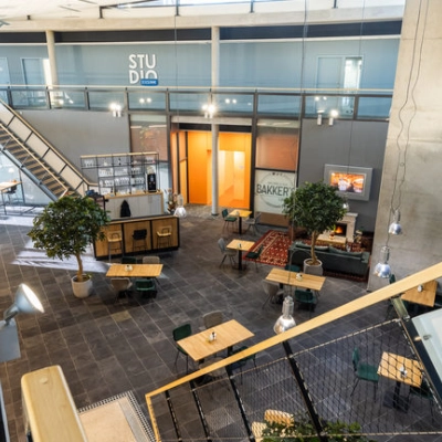 Spacious and modern office space in Oosterwolde with multiple workstations and a contemporary design, ideal for office space rental.