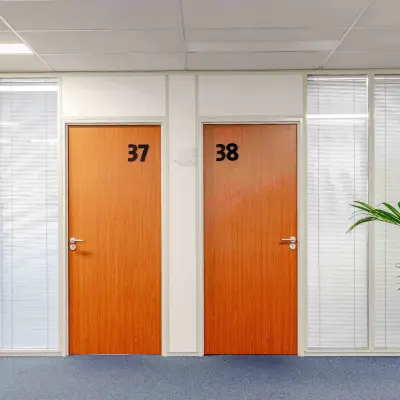 Interior hallway at Leeghwaterstraat 25, Reeuwijk, featuring two office doors with numbers 37 and 38, suitable for office space rental.