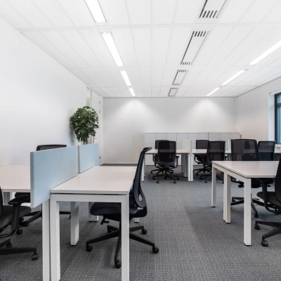 Modern office space for rent at Einsteinlaan 28, Rijswijk, featuring an open floor plan with desks and chairs, ideal for office space rental.