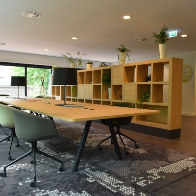 Modern office to rent at Laan van Vredenoord 33, Rijswijk. Features stylish furniture, vibrant decor, and ample natural light, perfect for office space rental.