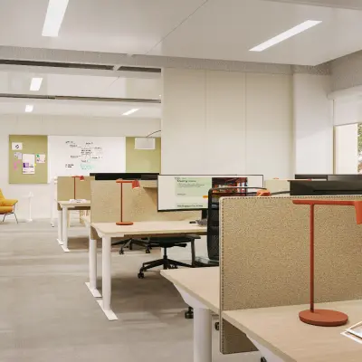 Modern office space for rent at Marten Meesweg 101, Rotterdam Alexander with workstations, computers, and natural light streaming through large windows.