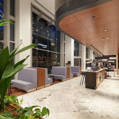 Spacious office at Blaak 555, Rotterdam Center, featuring modern furnishings and a well-lit open floorplan. Ideal for office space rental seekers.