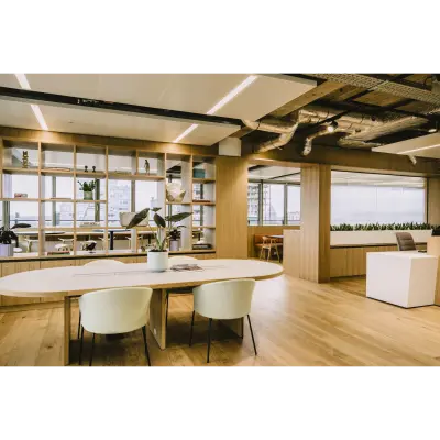 Modern furnished office space at Coolsingel 65 in Rotterdam Center, featuring a spacious open floorplan with sleek furniture and stylish decor available for rent.