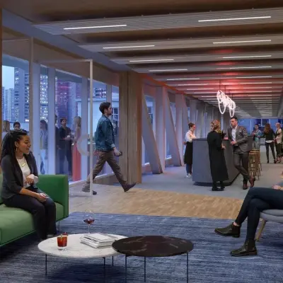 Modern office space in Rotterdam Center at Coolsingel 75, featuring a stylish open floorplan with people networking and relaxing, ideal for office space rental.