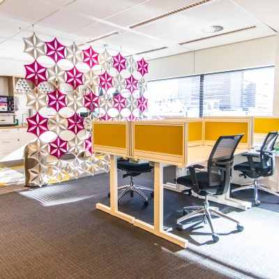 Bright office to rent at Weena-Zuid 130, Rotterdam Central Station, featuring a modern partition, four workstations, and abundant natural light.