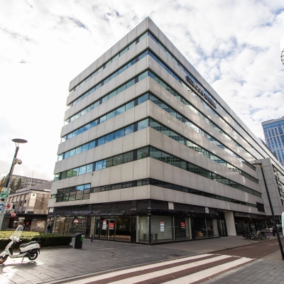 Exterior view of office building at Weena-Zuid 130, Rotterdam Central Station, available for office space rental.