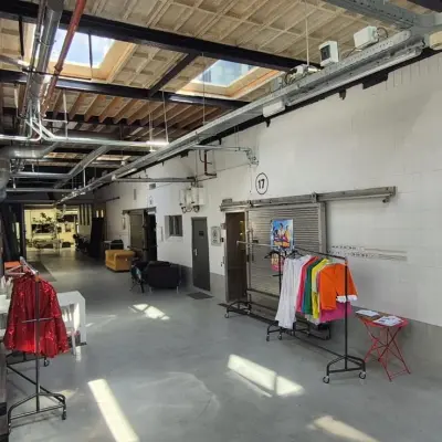 Interior office space at Van Helmontstraat 17-23, Rotterdam Delfshaven, featuring industrial-style decor and furnishings; ideal for office space rental.