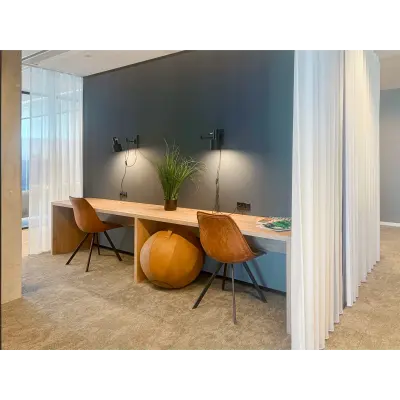 Modern furnished workspace at Wilhelminakade 173, Rotterdam Kop van Zuid, ideal for office space rental seeking functional and sleek design.