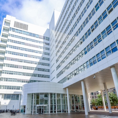 Exterior view of the modern office building at Kalvermarkt 53, The Hague Center, suitable for those seeking office space rental with ample light and sleek design.