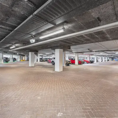 Spacious parking area at the office building on Leidseveer 2-10, Utrecht Central Station, suitable for easy access to office space rental.