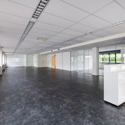 A spacious, unfurnished office interior at Atoomweg 350, Utrecht Lage Weide, perfect for rent office space. Bright and open, this office to rent offers versatility for various business activities.