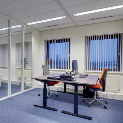 Bright, furnished office space for rent at Atoomweg 63, Utrecht Lage Weide, featuring modern desks and chairs, ideal for business activities.