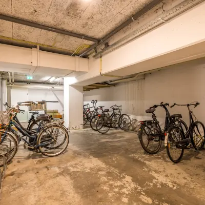 Basement bike storage area for office space rental at Goeman Borgesiuslaan 77, Utrecht North.